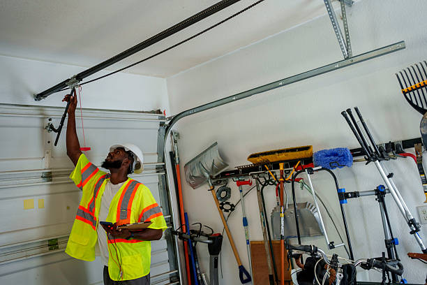 Professional Garage Door Roller Replacement technician working in Highland Park, NJ